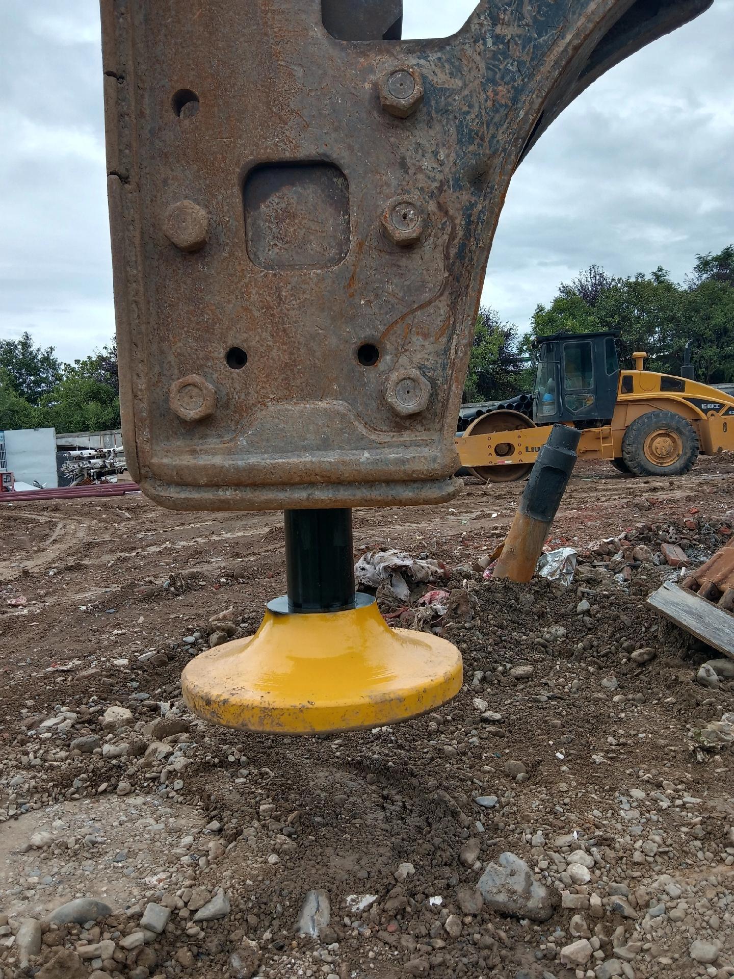 Excavator hydraulic breaker with compactor chisel for effective soil compacting